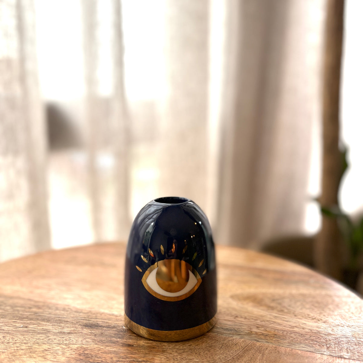 Porta velas de ojito
