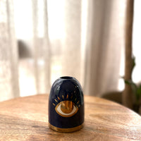 Porta velas de ojito
