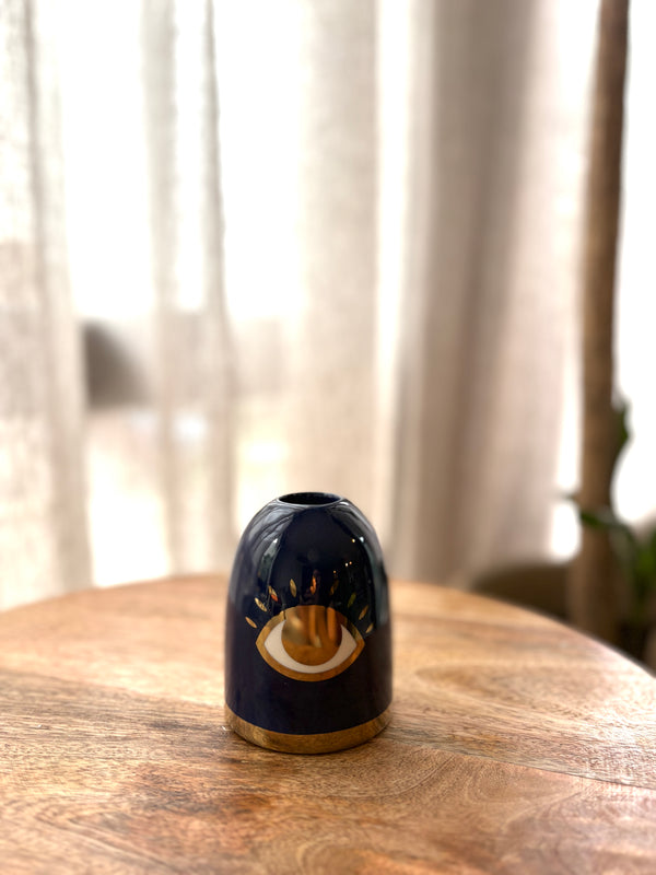 Porta velas de ojito